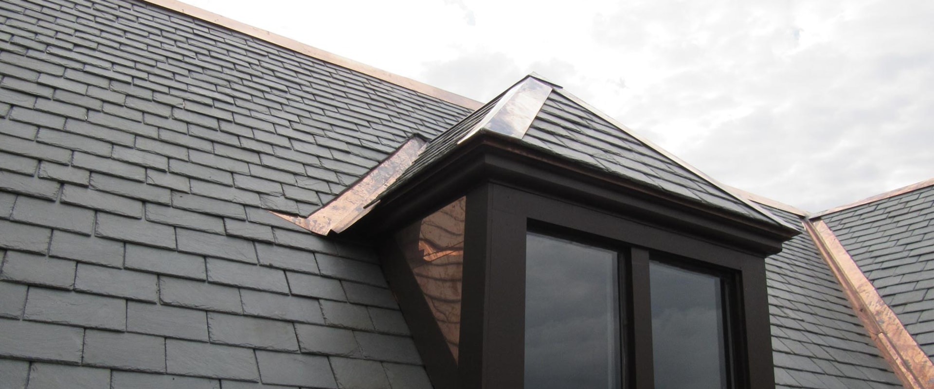 How much does it cost to reroof a 1000 sq ft house?
