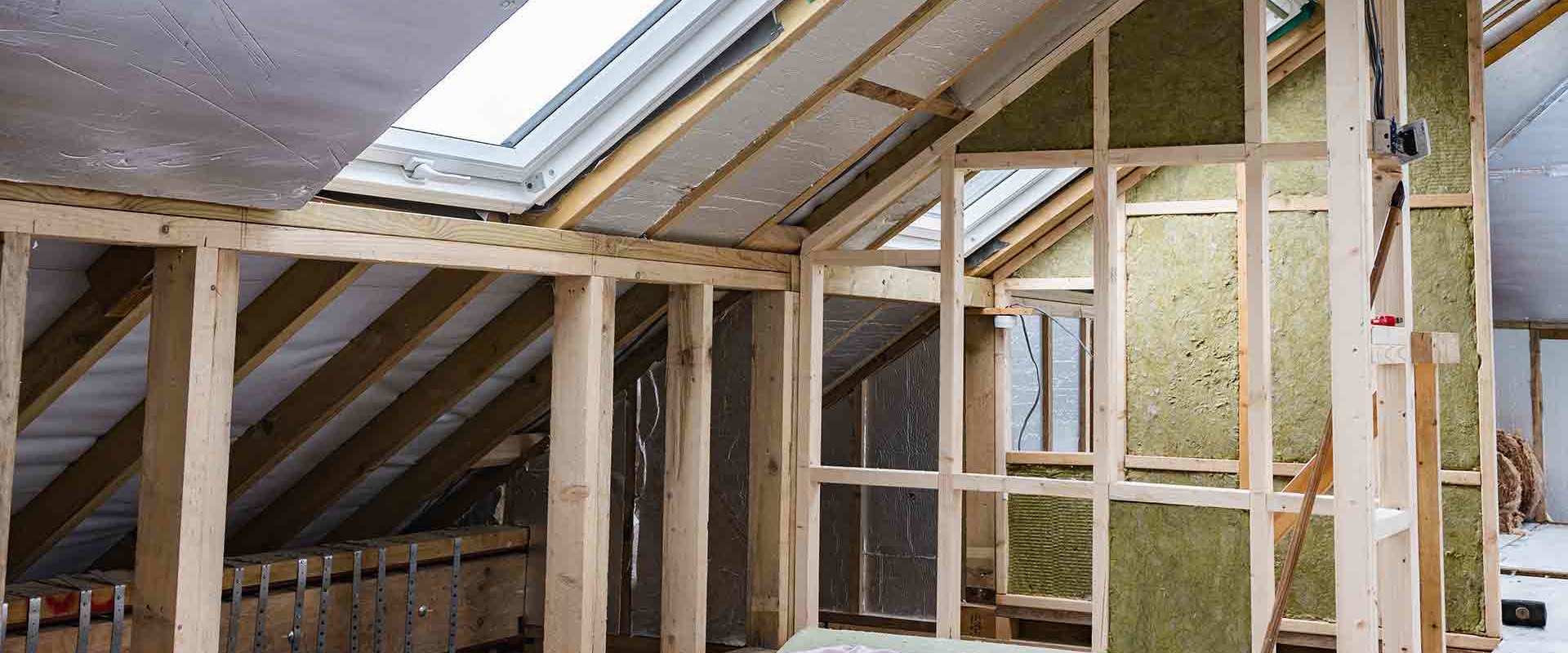 Is it ok to put insulation between roof rafters?