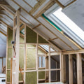 Is it ok to put insulation between roof rafters?